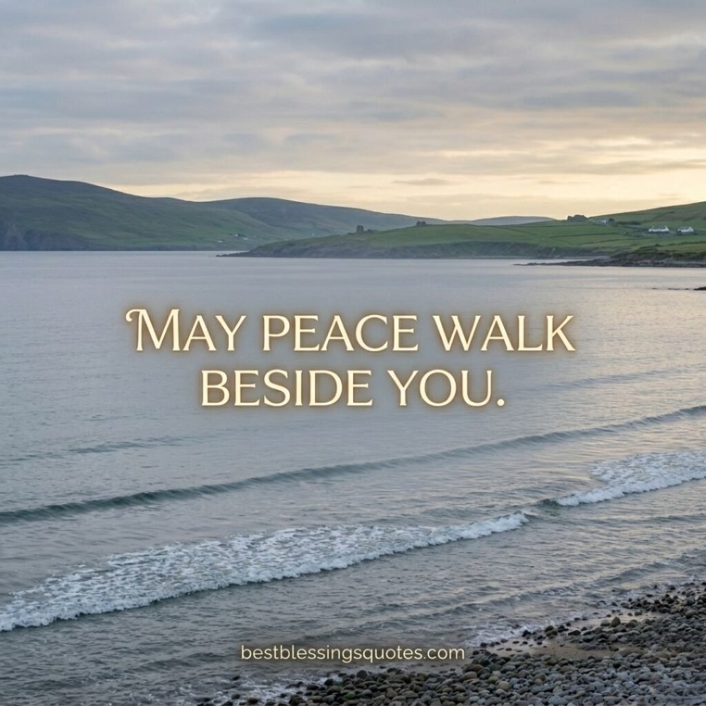 May peace walk beside you Irish blessing quote with calm ocean and coastal background