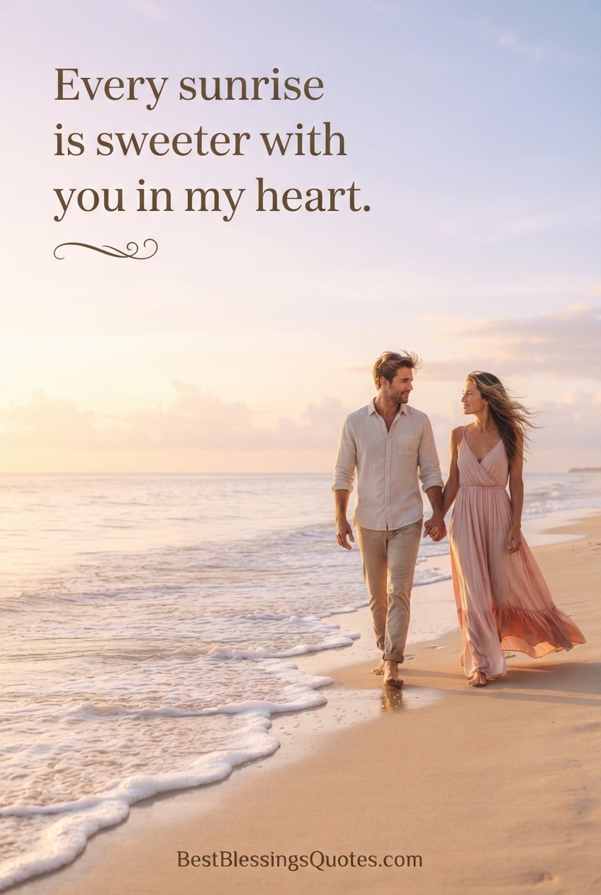 A loving couple walking together on the beach at sunrise, symbolizing heartfelt good morning wishes for him.